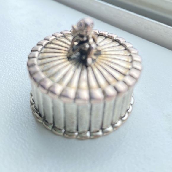 Tiny treasure box, silver round box with angel on top.‎ Size of a silver dollar. - Picture 2 of 4